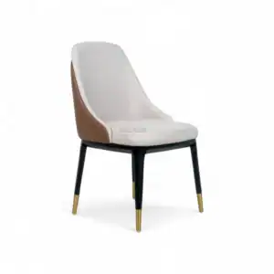 Sleek modern dining chair with beige and brown leather upholstery and black gold-accented legs.