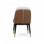 Modern leather dining chair with black and gold legs, stylish and comfortable furniture from Geluoer.
