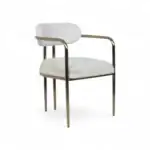 Modern white upholstered dining chair with metal frame and armrests for stylish furniture decor.