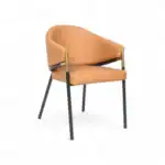 Sleek modern leather accent chair with black and gold metal frame for stylish home decor.
