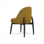 Stylish mustard yellow upholstered armchair with black wooden legs, modern furniture design for living rooms.