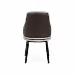 Sleek modern dining chair with leather upholstery and black wooden legs.