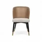 Luxurious modern dining chair with leather and fabric upholstery, gold-tipped legs, ideal for contemporary interior design.