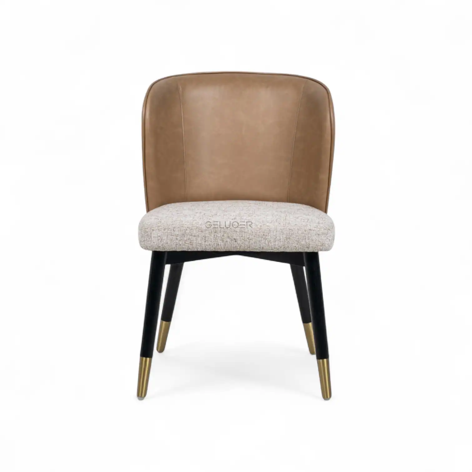 Luxurious modern dining chair with leather and fabric upholstery, gold-tipped legs, ideal for contemporary interior design.