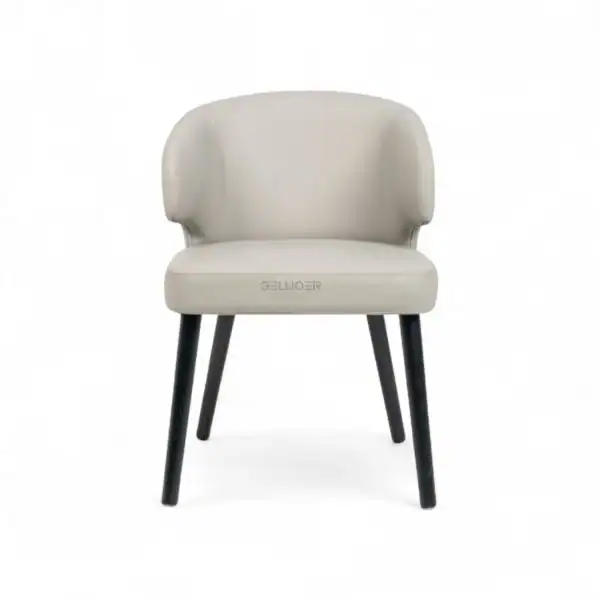 Elegant white leather dining chair with black wooden legs, modern and stylish furniture design.
