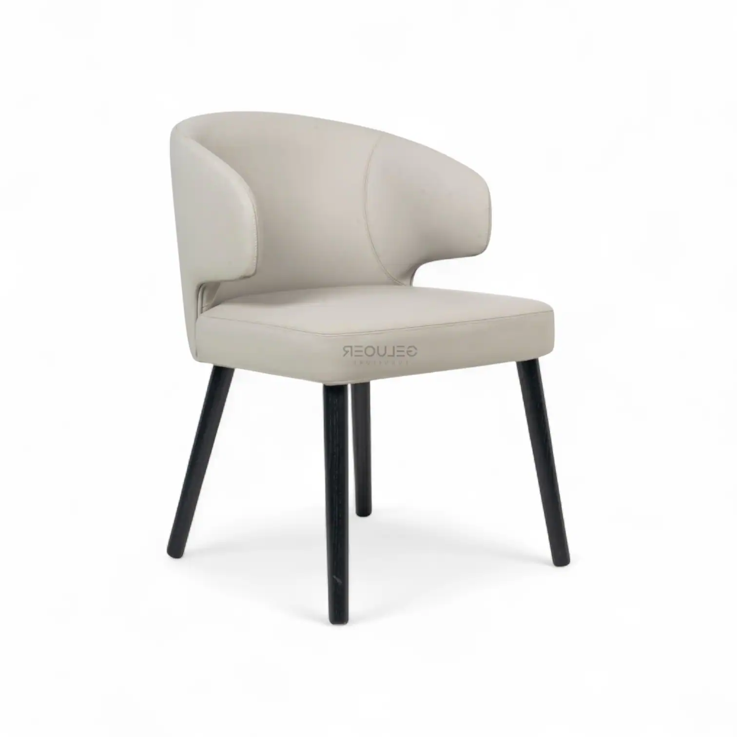 Contemporary white upholstered accent chair with black wooden legs.