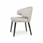 Modern white upholstered dining chair with black wooden legs for stylish home decor.