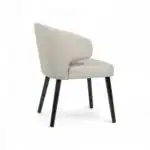 Modern beige upholstered accent chair with black wooden legs for stylish home decor.