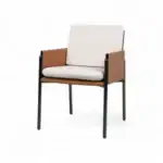 Modern armchair with beige cushions and black metal legs, stylish and comfortable furniture piece.