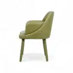 Soft green modern accent chair with wooden legs, perfect for contemporary living spaces.