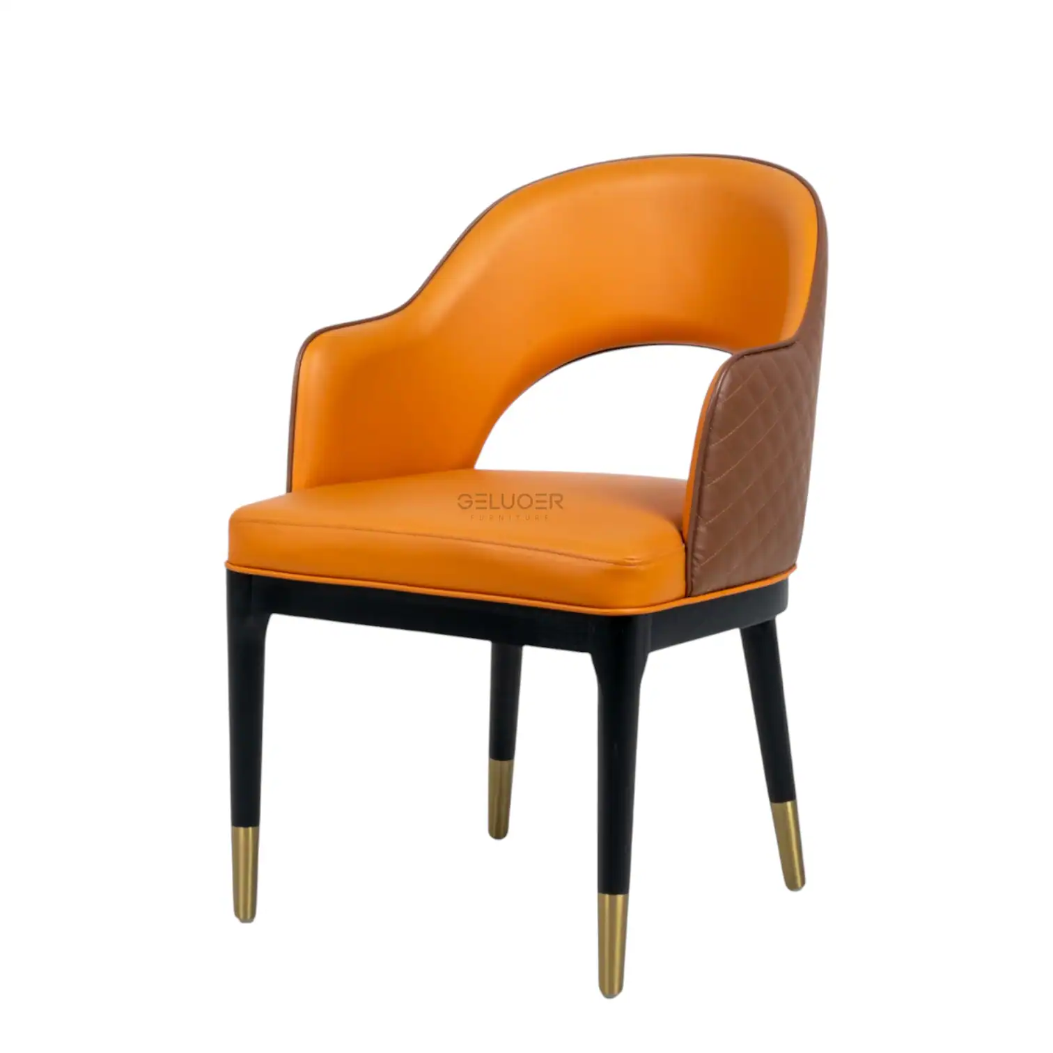 Luxurious orange and brown leather armchair with quilted accents and gold-tipped legs.