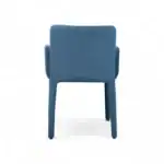 Blue velvet upholstered modern dining chair with wooden legs for stylish home decor.