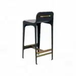 Sleek black bar stool with gold accents, modern design perfect for stylish interiors.