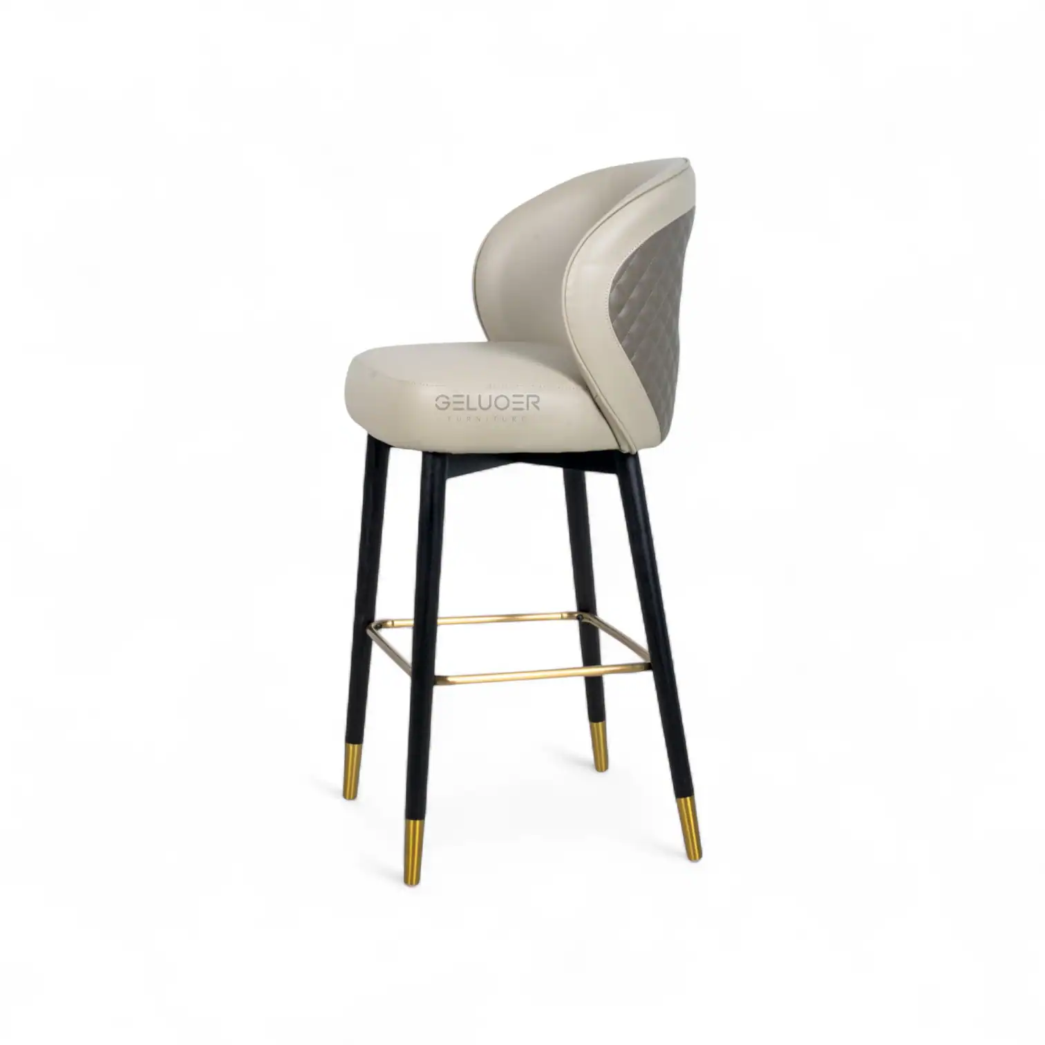 Luxury modern dining chair with beige leather upholstery and black wooden legs.