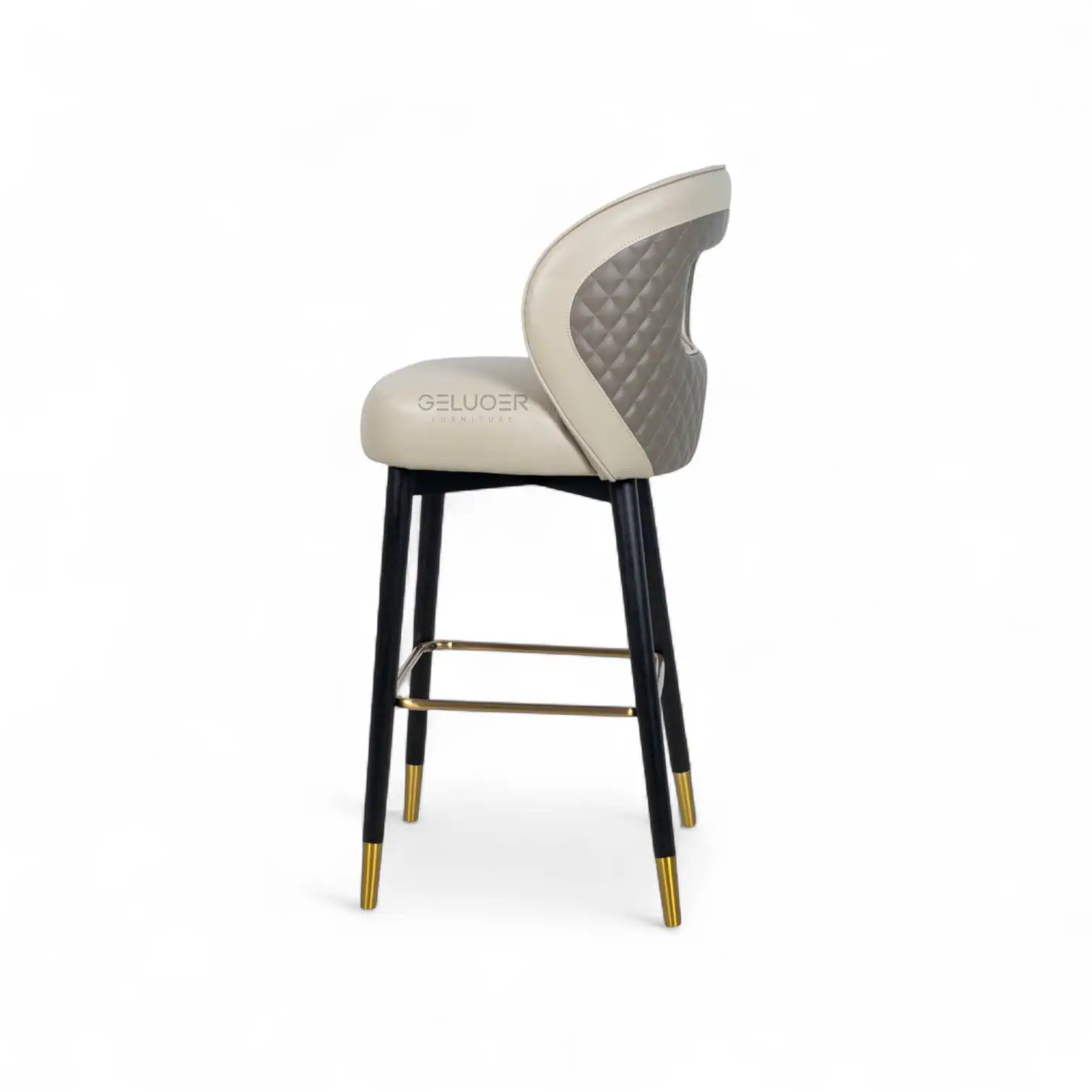 Luxury modern high-back bar stool with quilted leather upholstery and gold-accented legs.