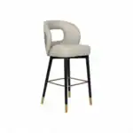 Modern beige upholstered bar stool with black and gold accent legs from Geluoer Furniture.