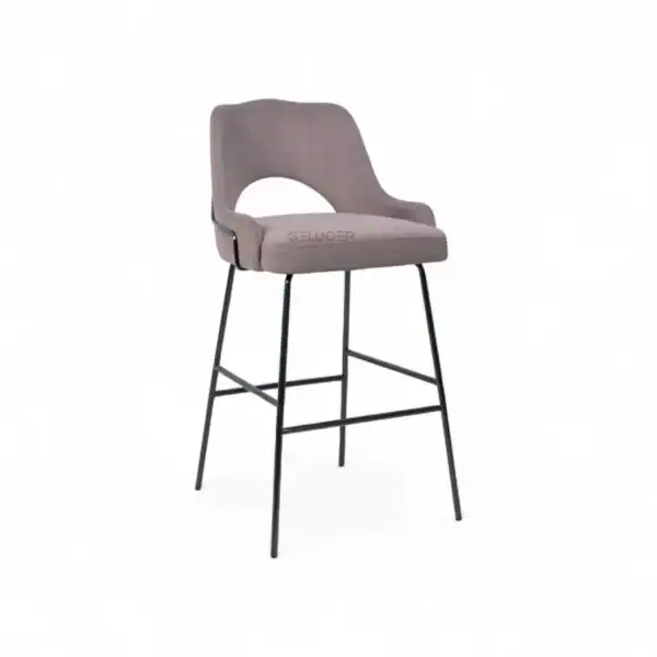 Luxurious modern upholstered bar stool with black metal legs for stylish kitchen or bar seating.