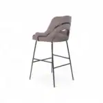 Luxurious upholstered bar stool with sleek metal legs and modern comfort design.