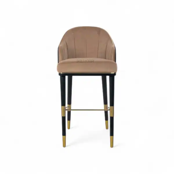 Elegant modern bar stool with beige velvet upholstery and black gold-accented legs for luxury home decor.