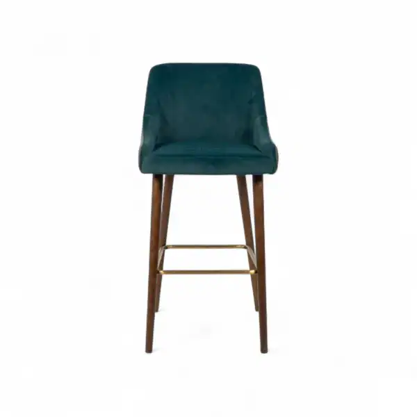 Comfortable modern bar stool in teal velvet with wooden legs.
