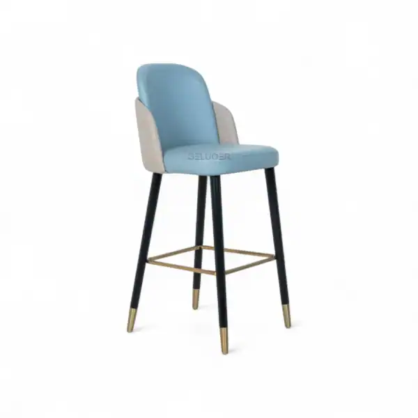 Sleek modern bar stool with blue and beige upholstery, black wooden legs, and gold accents.
