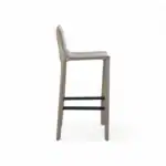 Sleek modern bar stool with metal frame, comfortable upholstered seat, and footrest for stylish dining spaces.