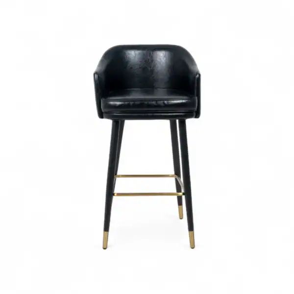 Mid-century modern black leather bar stool with gold accents and wooden legs.