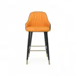 Luxurious orange upholstered bar stool with black and gold metal accents, perfect for modern home or commercial decor.