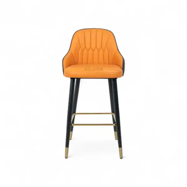 Luxurious orange upholstered bar stool with black and gold metal accents, perfect for modern home or commercial decor.