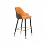 Vibrant orange and black modern dining chair with gold accents, stylish and comfortable for contemporary home decor.