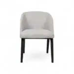 Modern upholstered dining chair with dark wooden legs for contemporary interior decor.