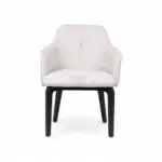Contemporary white upholstered armchair with black wooden legs, elegant modern furniture design.