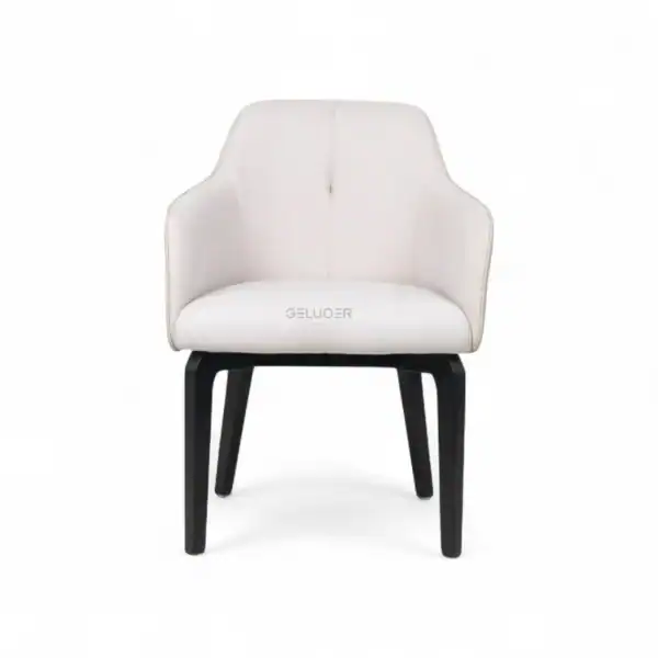 Contemporary white upholstered armchair with black wooden legs, elegant modern furniture design.
