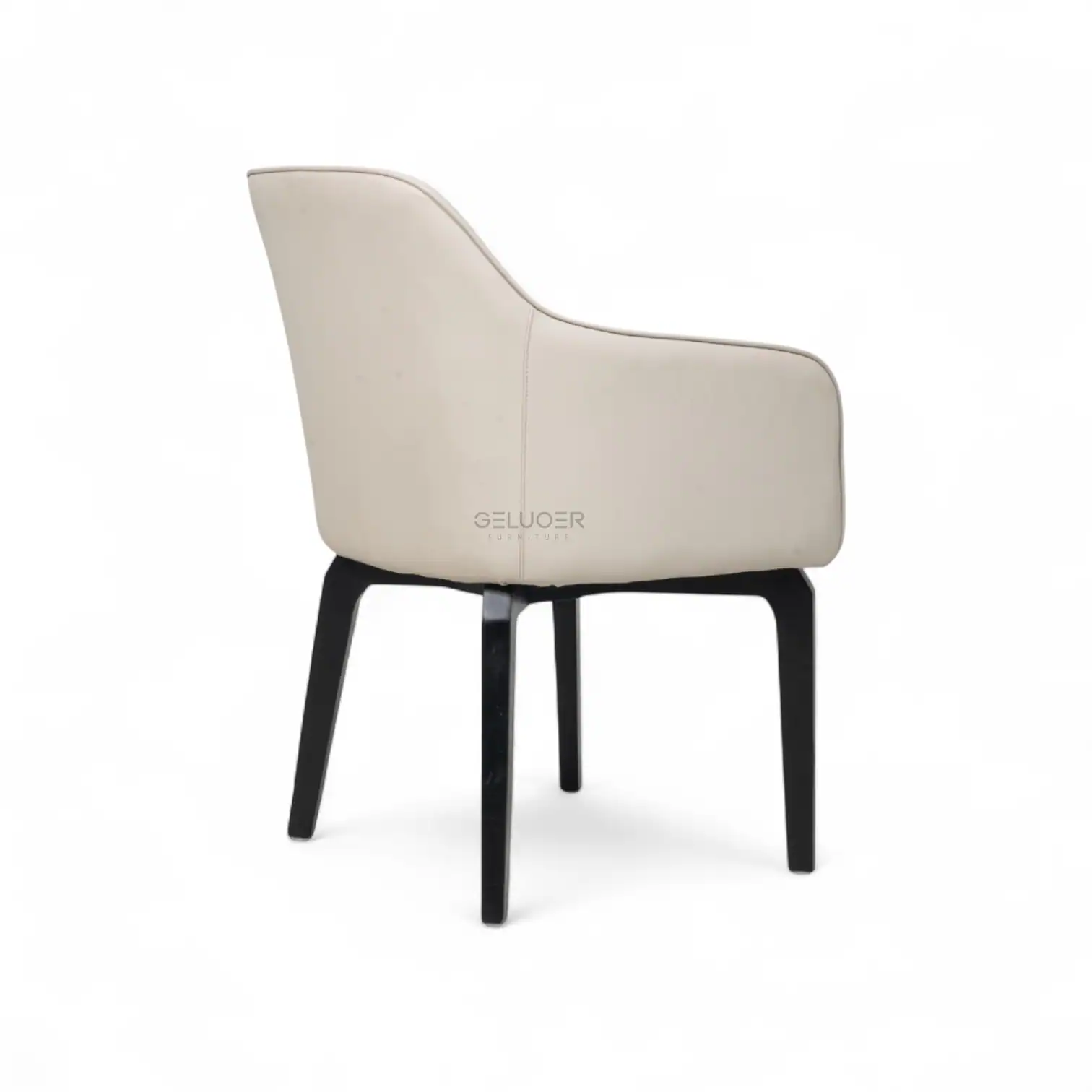 Luxurious beige upholstered armchair with black wooden legs, modern designer furniture piece.