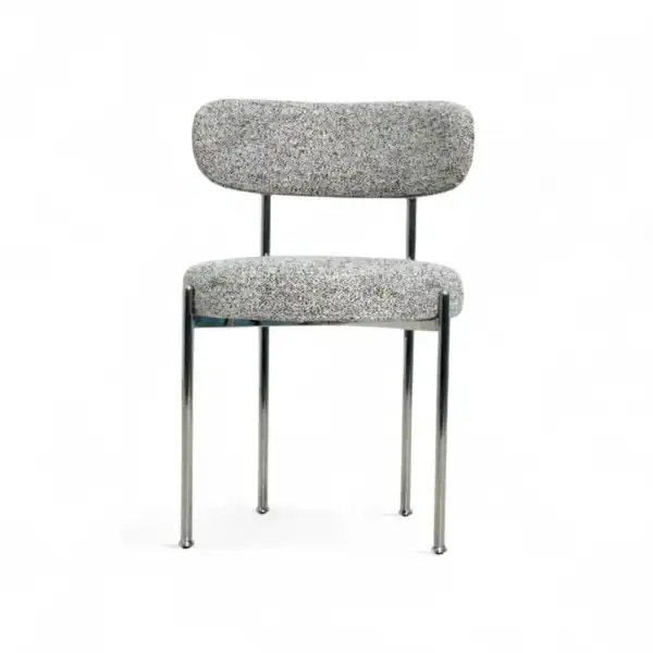 Modern upholstered chair with metal legs and retro design, ideal for contemporary living spaces.