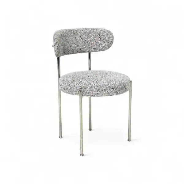 Modern upholstered dining chair with chrome frame and dotted fabric, stylish for contemporary home decor.