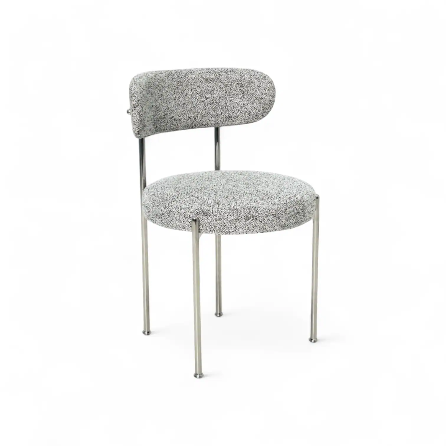 Modern upholstered dining chair with chrome frame and dotted fabric, stylish for contemporary home decor.