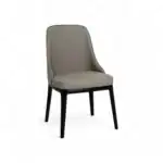 Contemporary beige upholstered dining chair with black wooden legs by Geluoer Furniture.