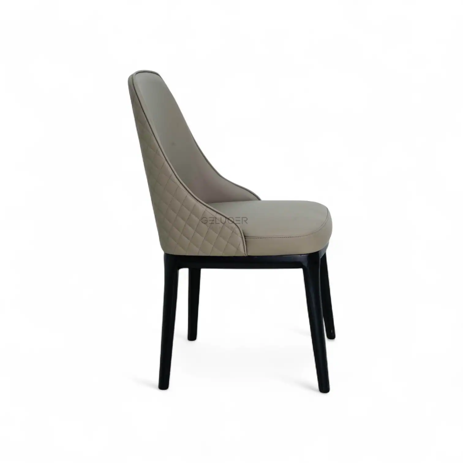 Elegant beige quilted leather dining chair with black wooden legs, perfect for modern interiors.