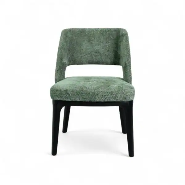 Vintage green upholstered dining chair with wooden legs for modern home decor.