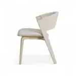 White luxury modern dining chair with ergonomic design, upholstered in high-quality leather for comfort.
