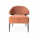 Plush coral-colored modern armchair by Geluoer Furniture with sleek black metal legs.