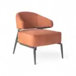 Softer peach-colored modern lounge chair with metal legs, stylish and comfortable for contemporary home decor.