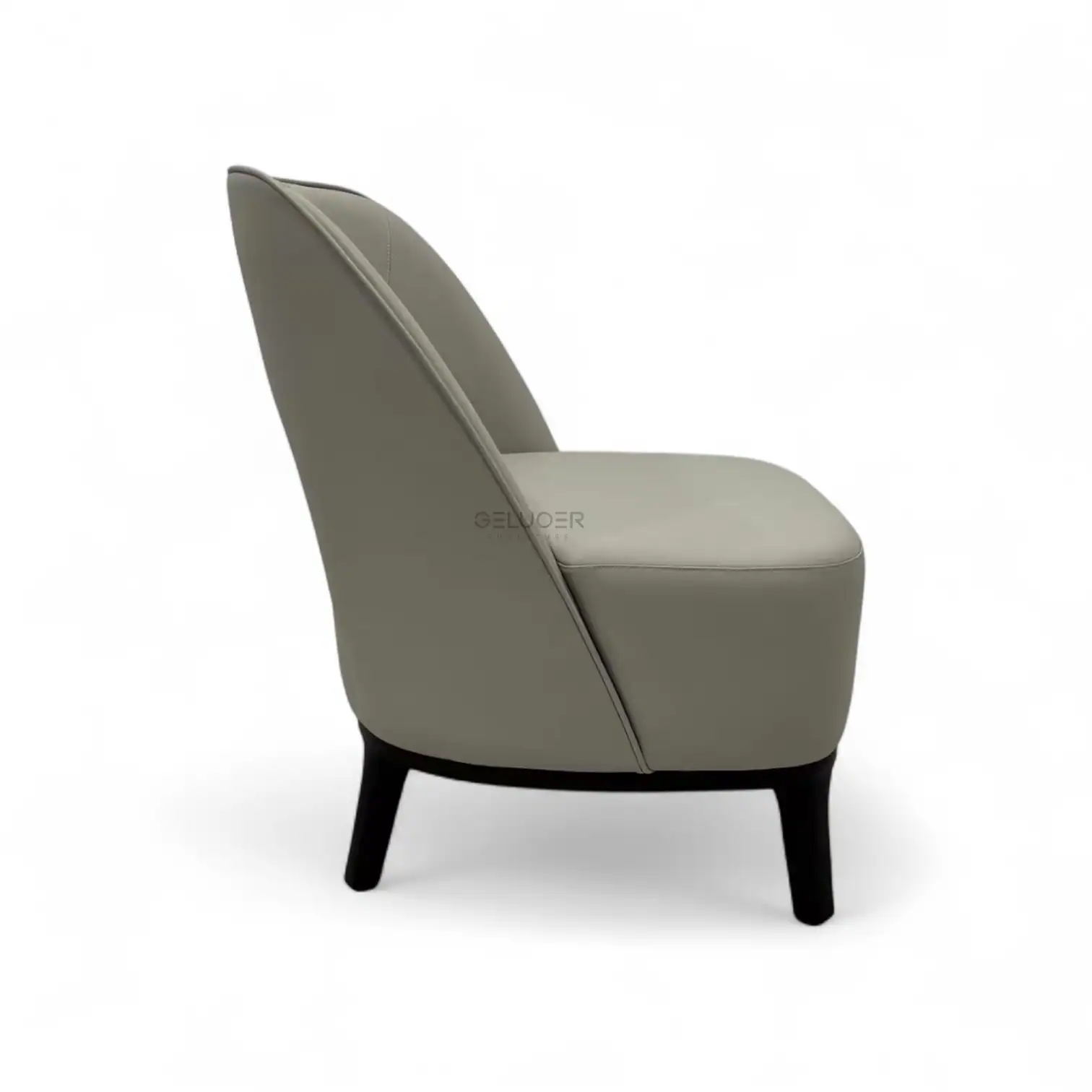Contemporary beige upholstered accent chair with black wooden legs.