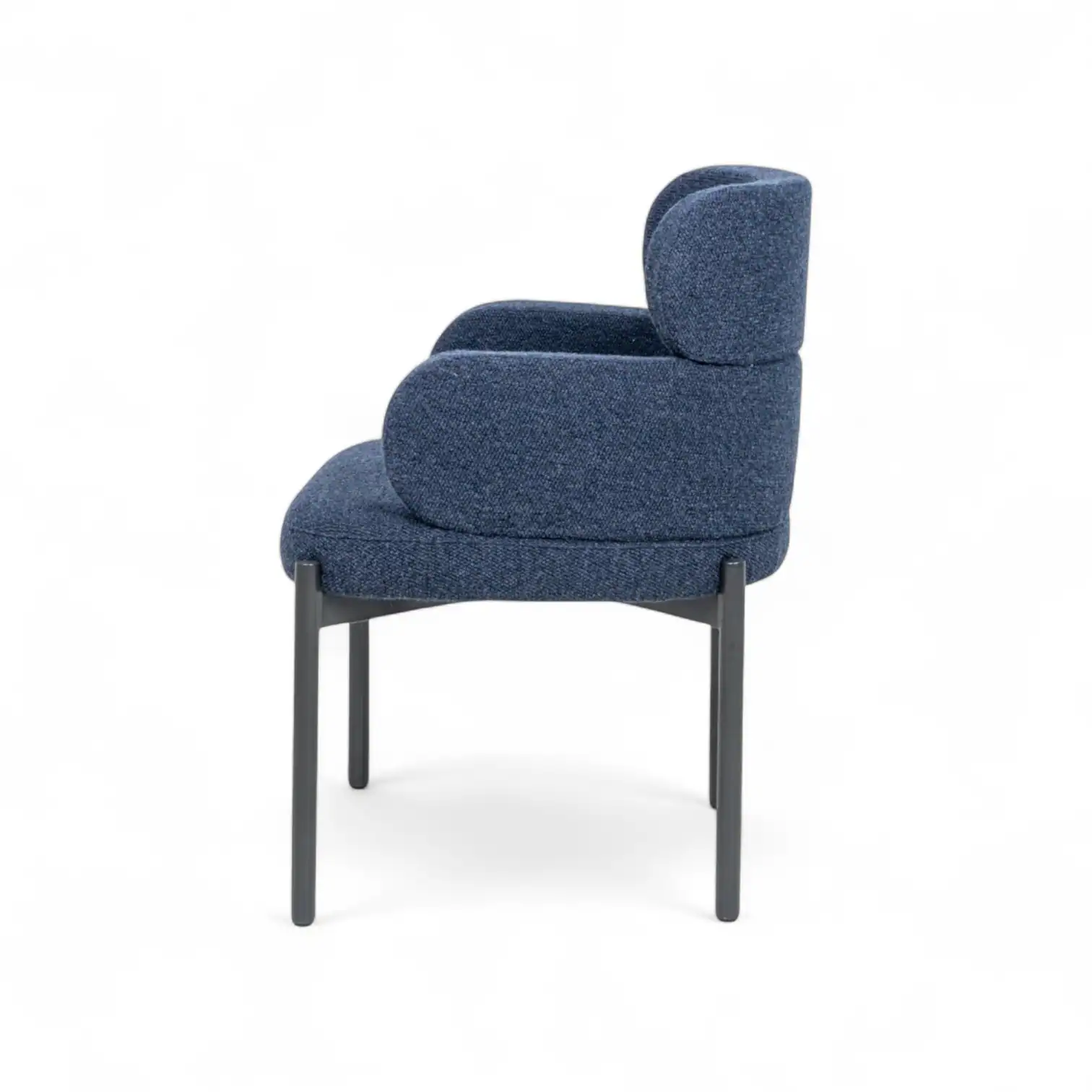 Comfortable blue upholstered armchair with wooden legs, modern design for living room or office.