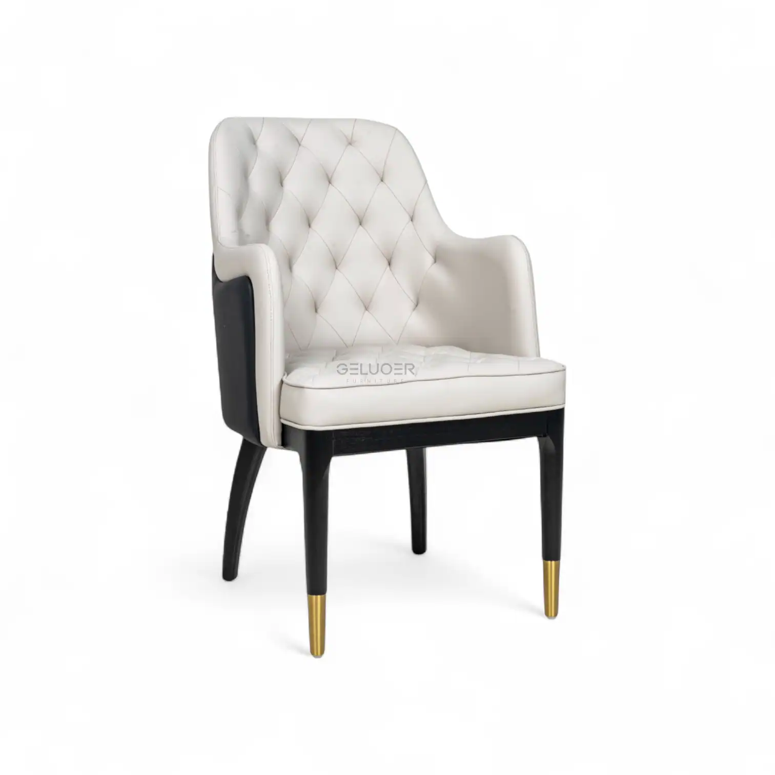 Elegant white quilted accent chair with black wooden legs and gold-tipped feet, stylishly designed for luxury furniture décor.