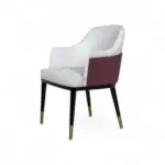 Stylish modern dining chair with upholstered white and burgundy fabric and black gold-accented legs.