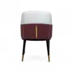 Luxurious modern upholstered accent chair with a chic two-tone design and stylish gold accents.