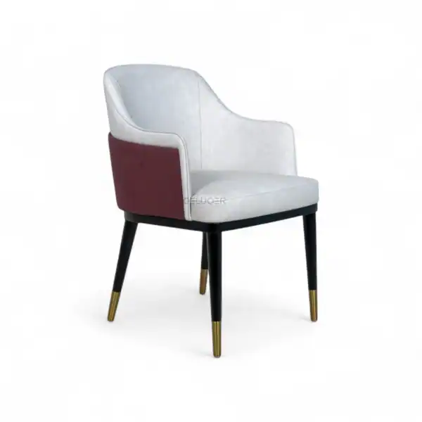 Luxurious modern dining chair with white and maroon upholstery, black legs with gold tips, perfect for stylish home decor.