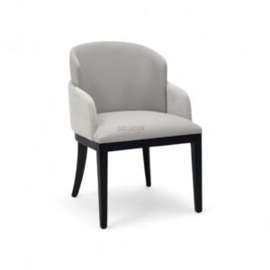 Elegant modern dining chair with upholstered seat and backrest, black wooden legs.